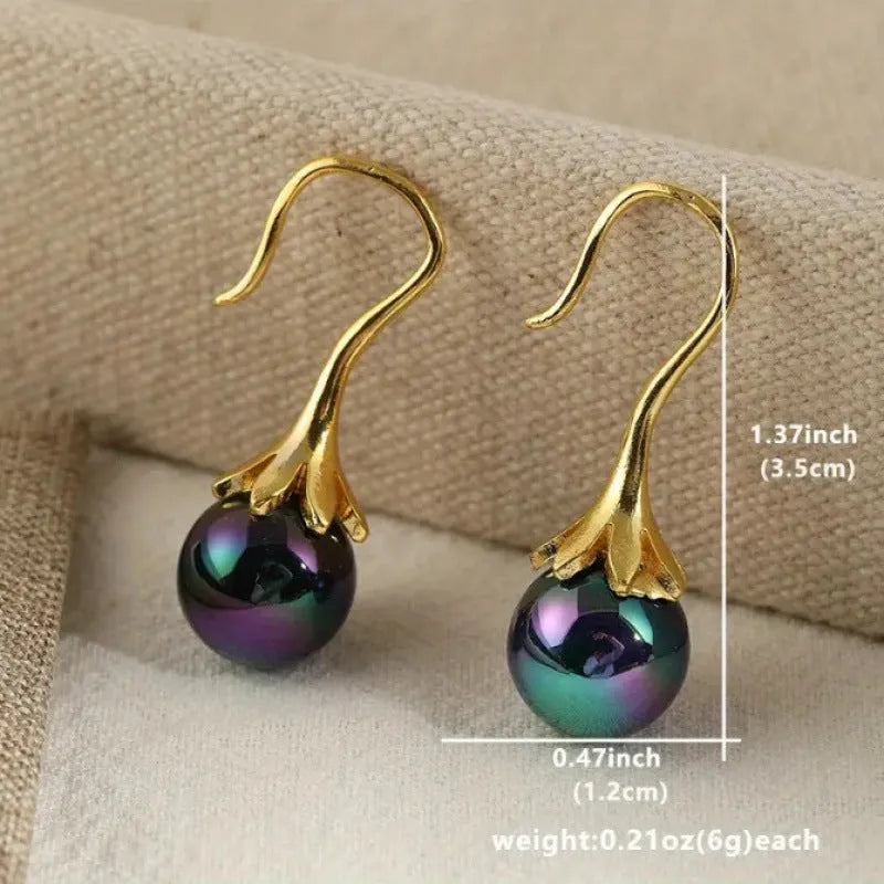 Women's retro design alloy earrings with imitation gold electroplating finish
