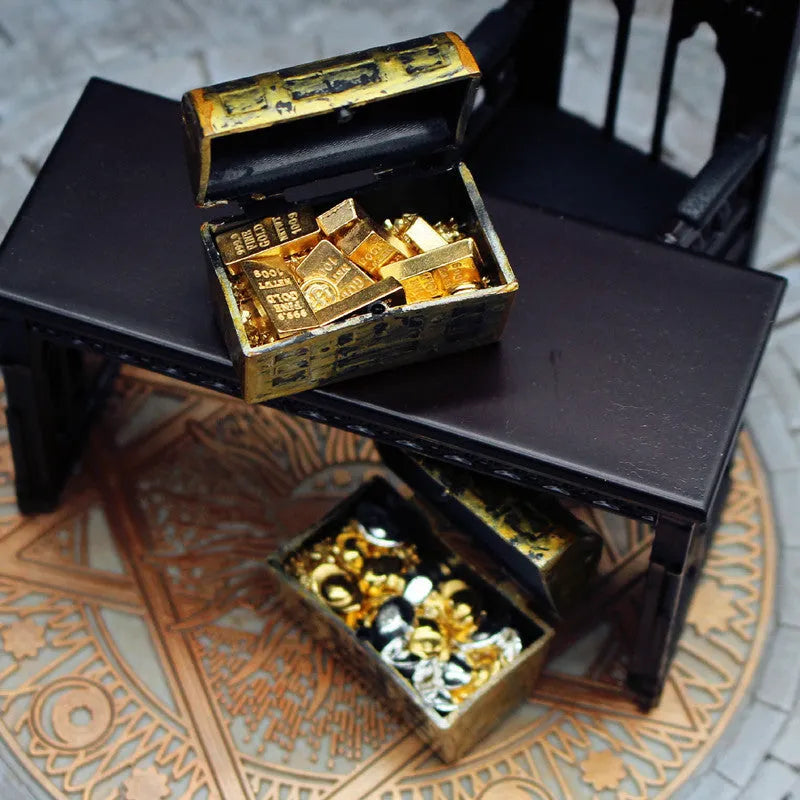 Miniature metal alloy gold coin and bar treasure box doll house accessory.