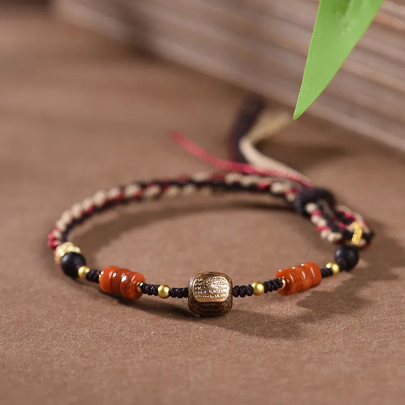 Hand woven ethnic bracelet with lapis lazuli colour and rope design on flexible wire