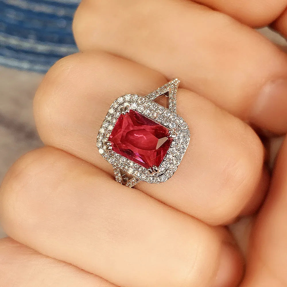 Red copper square ring with rhinestones for women, shown in size 8.