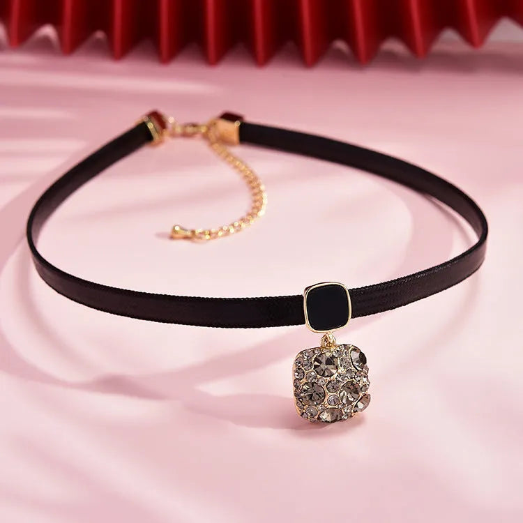 Alloy short necklace with grey diamond square pendant, black rhimestone accents, and adjustable 21-50cm chain on white background