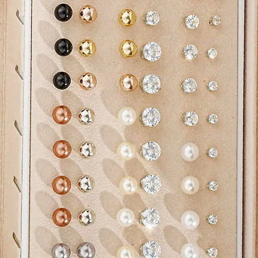 108 geometric alloy earrings with round elements in gold and yellow electroplated finishes