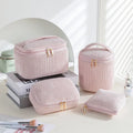 Four cube-style flannelette makeup bags in a set, shown in blue with dots colour.
