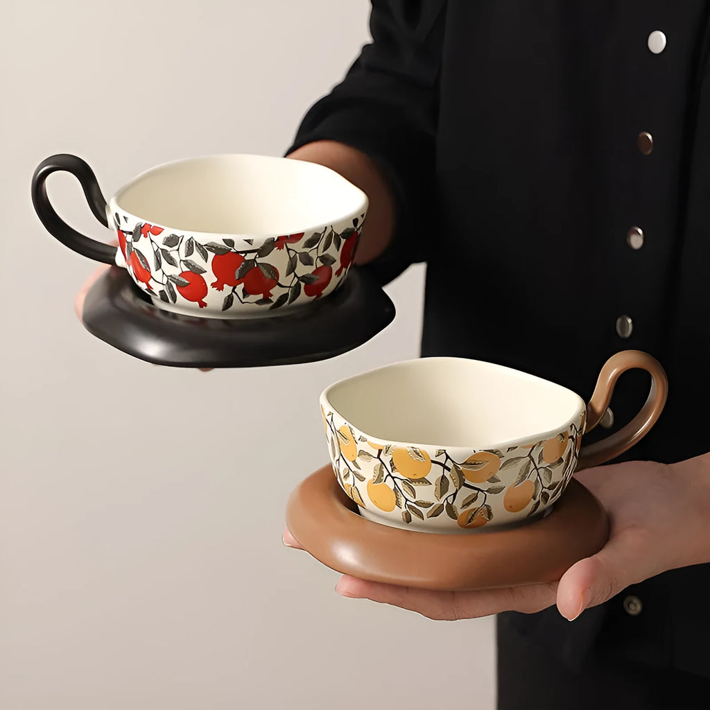 Antique style ceramic coffee cup and saucer set in black or orange, 210ml capacity.