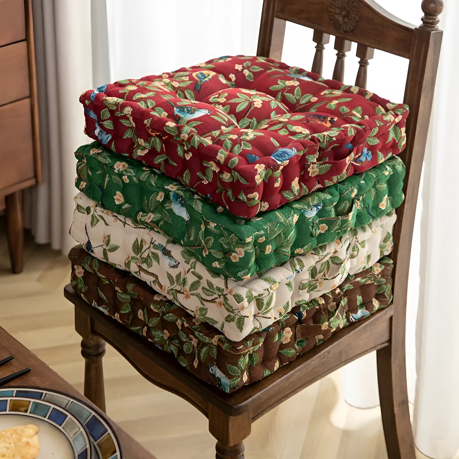 American dining chair cushion 40x40x8cm in apricot floral pattern on a chair.