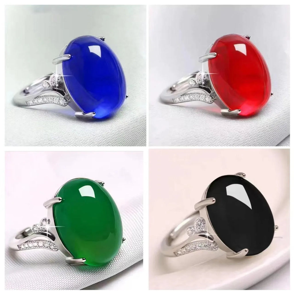 Geometric adjustable alloy ring on a hand, shown in blue finish.
