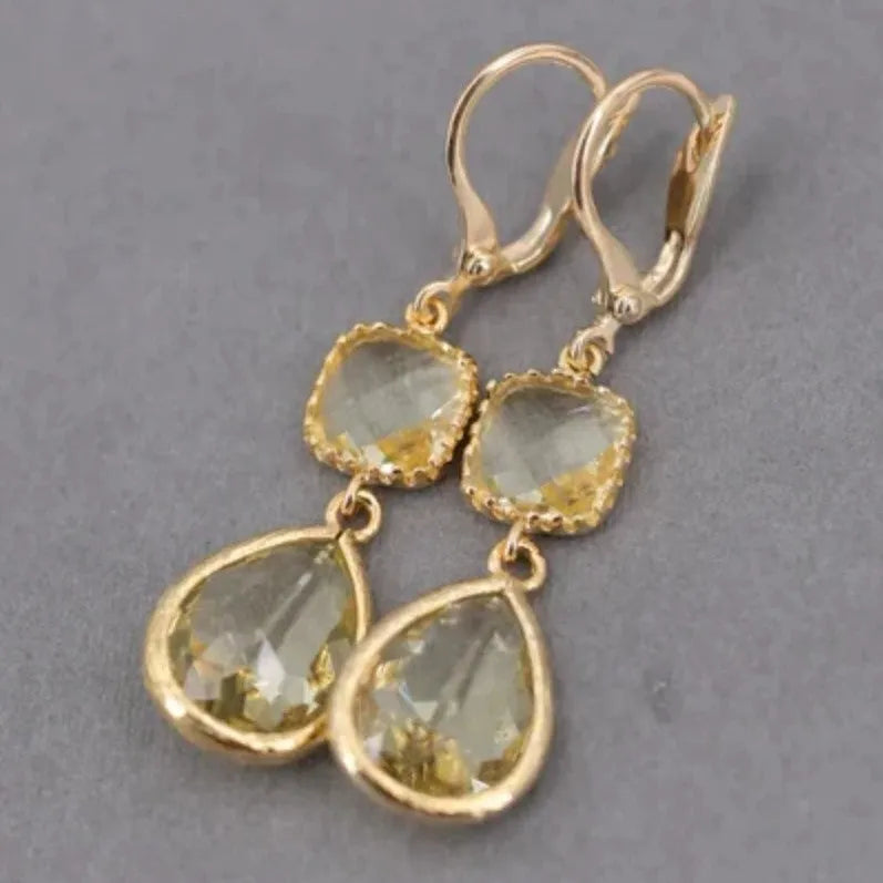 Gold geometric long fringe earrings with crystal water droplet design on copper base