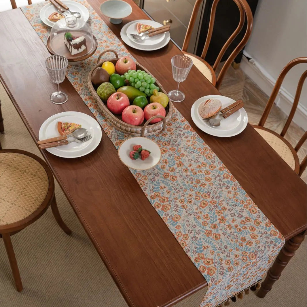 American-style long tassel table runner with Jacquard floral pattern on a table