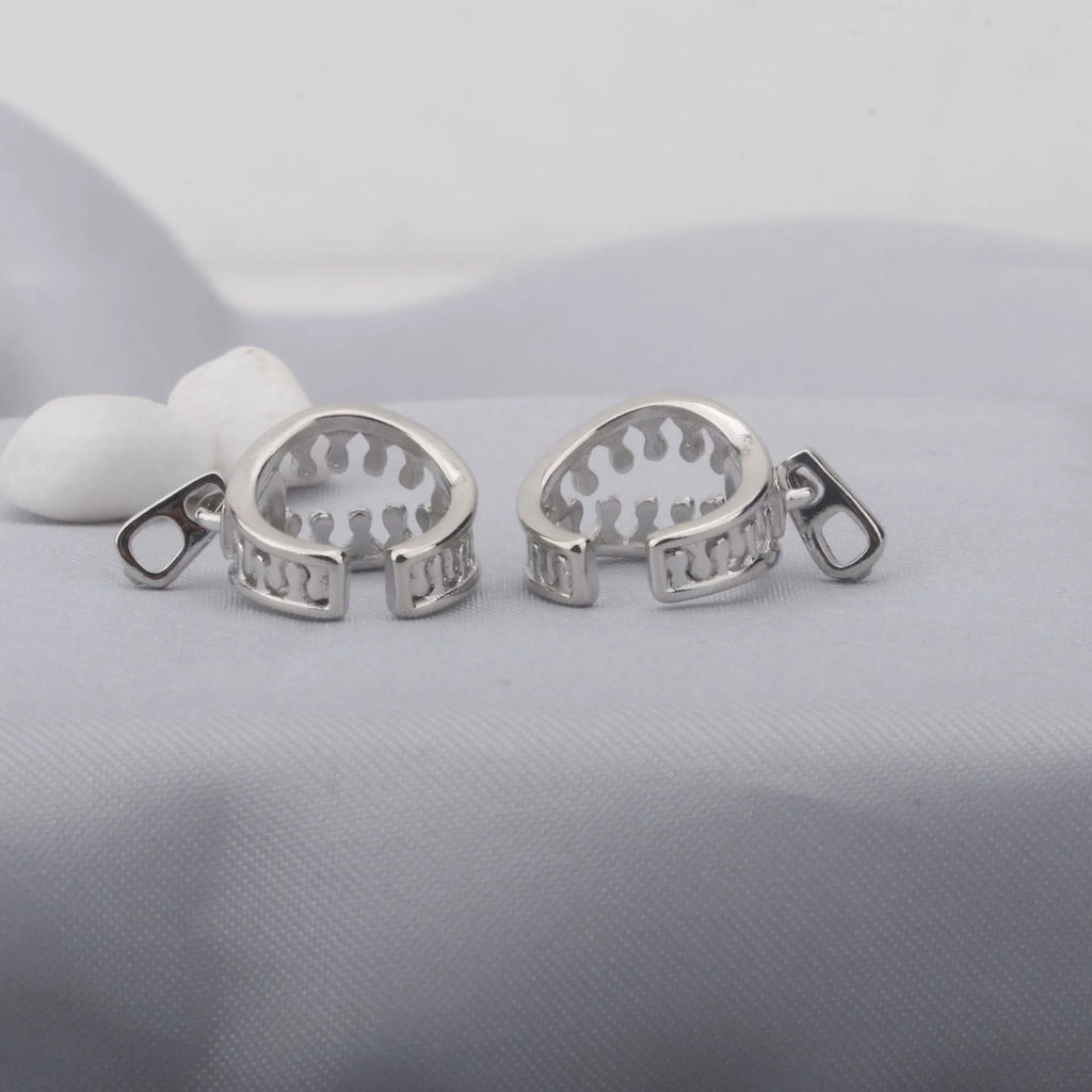 Copper geometric earrings with zipper clip fastening in ES862 colour showing line detail design