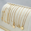 10-piece women's gold necklace set with snake bone chain and alloy pendants