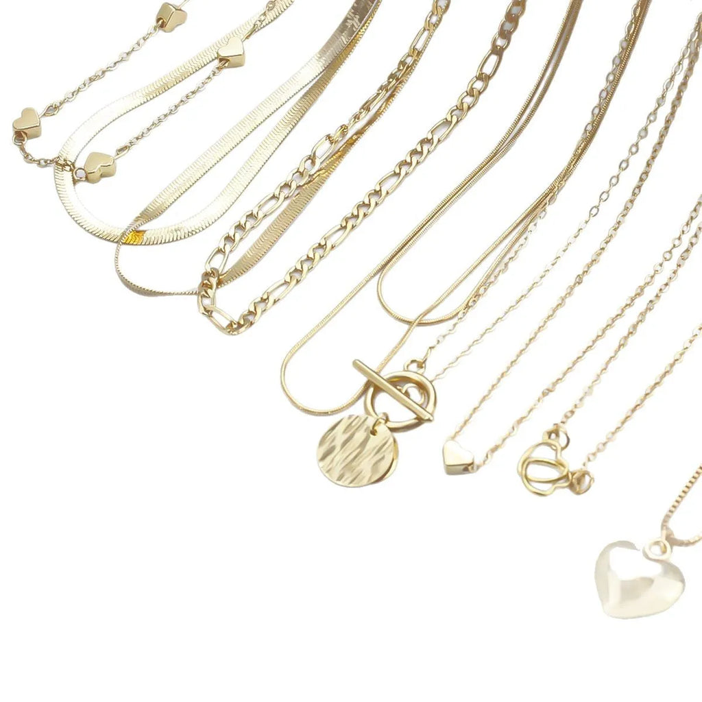 10-piece women's gold necklace set with snake bone chain and alloy pendants