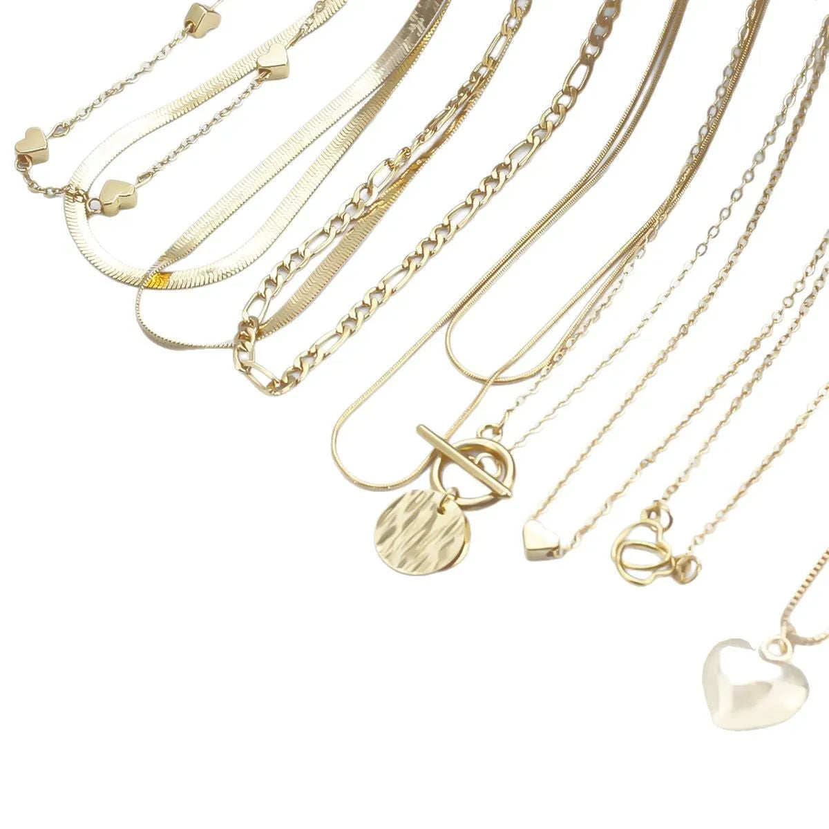 10-piece women's gold necklace set with snake bone chain and alloy pendants
