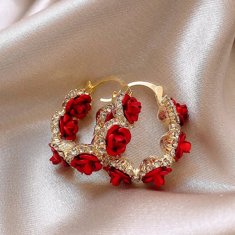 Red flower-shaped alloy clip earrings with rose motif for women