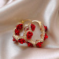 Red flower-shaped alloy clip earrings with rose motif for women