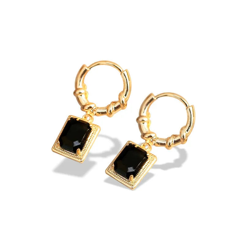 Pair of black geometric French court earrings with zircon stones on copper.