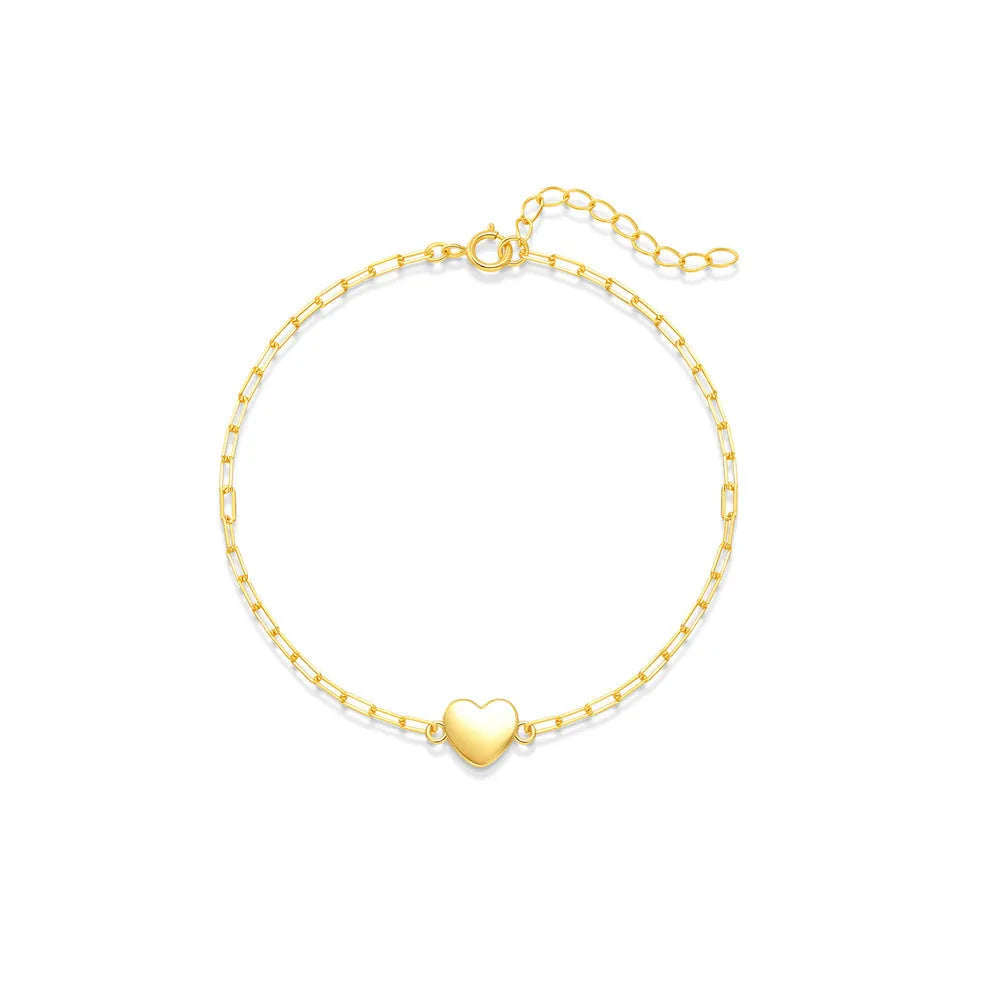 Gold tone S925 sterling silver bracelet with heart charm and clip chain closure