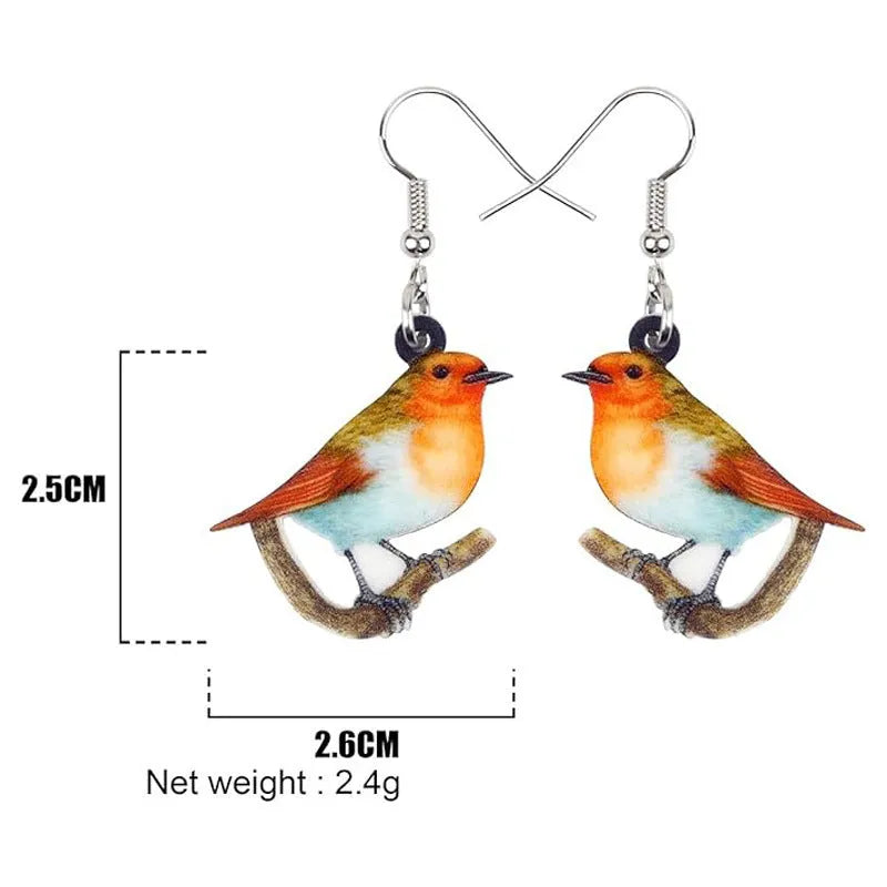 Acrylic geometric pendant earrings with a printed blue titmouse and snake chain design.