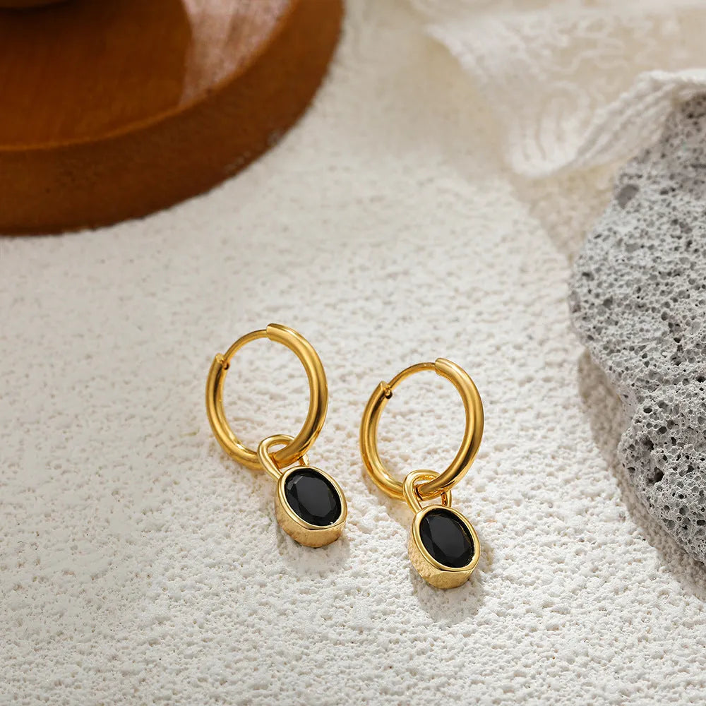 Women's retro oval zircon copper earrings in six colour variations on display
