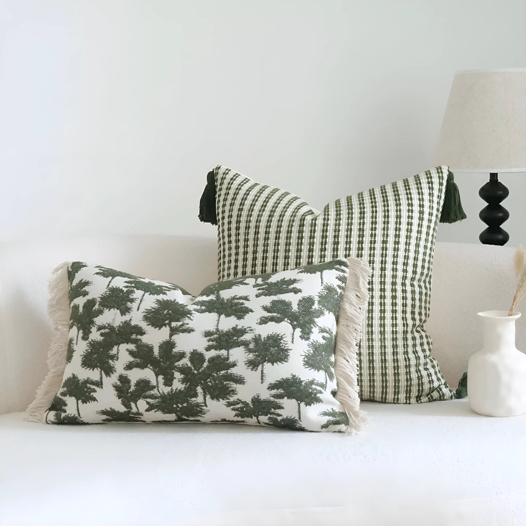 Green decorative hotel pillow set with striped and leafy patterns, shown with a matching pillow core.