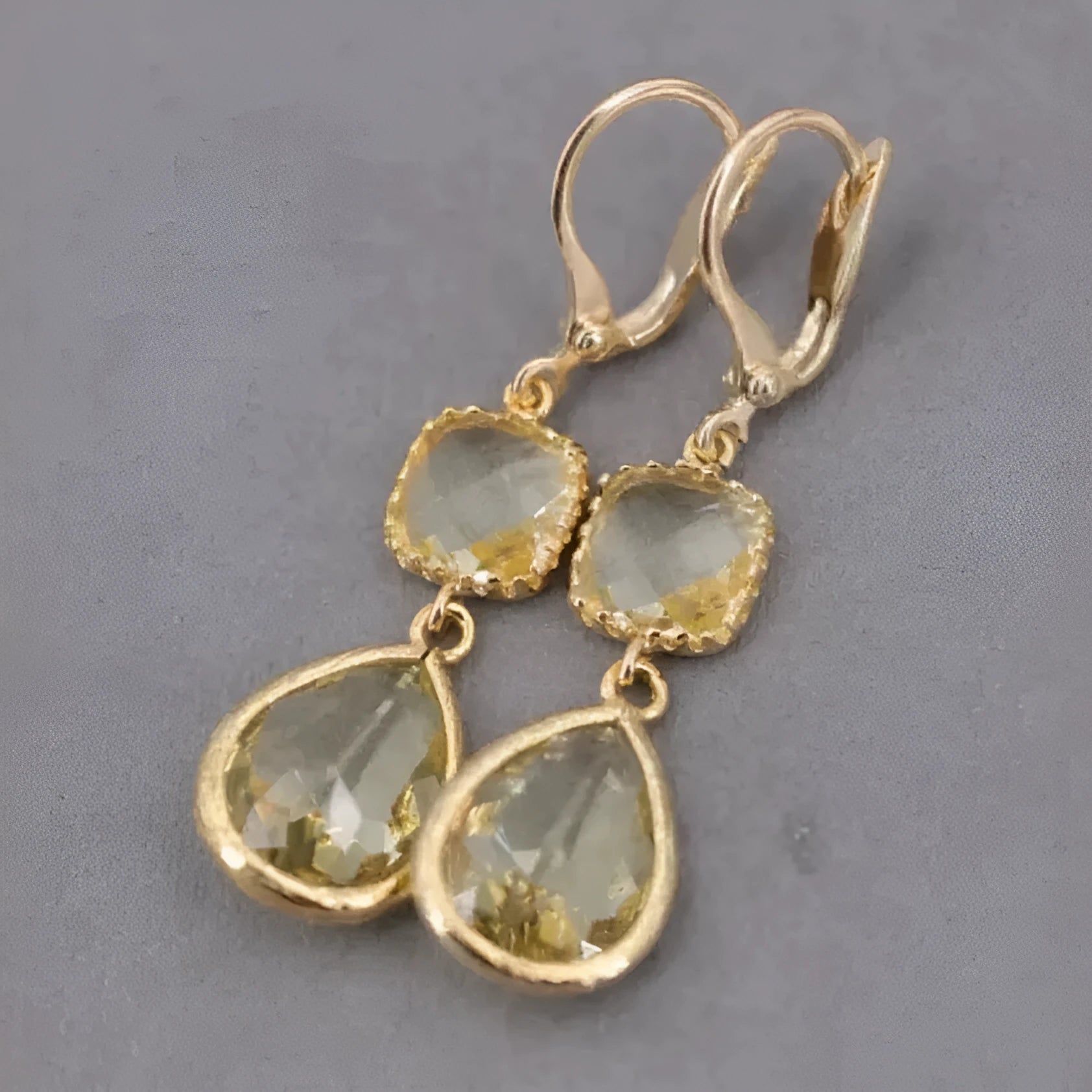 Gold geometric long fringe earrings with crystal water droplet design on copper base