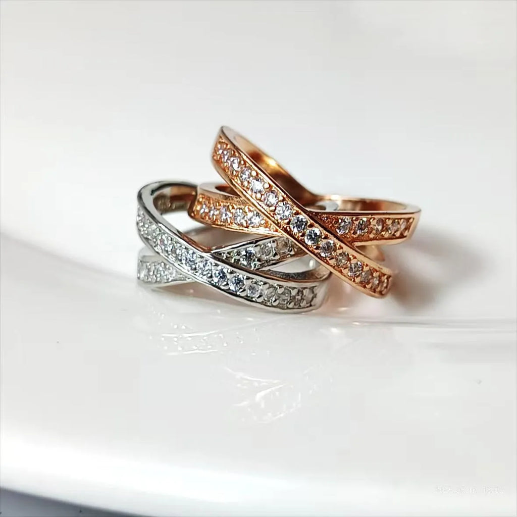 Copper cross ring with micro-inlaid zircon stones in geometric heart design, available in silver or rose gold finishes