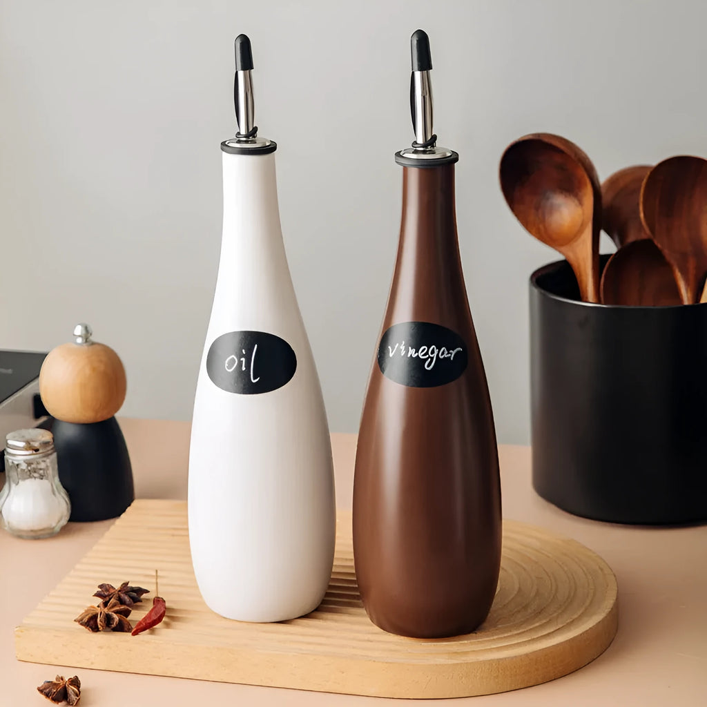 Ceramic oil pot with attached brush in black, coffee or white colours for kitchen oil storage