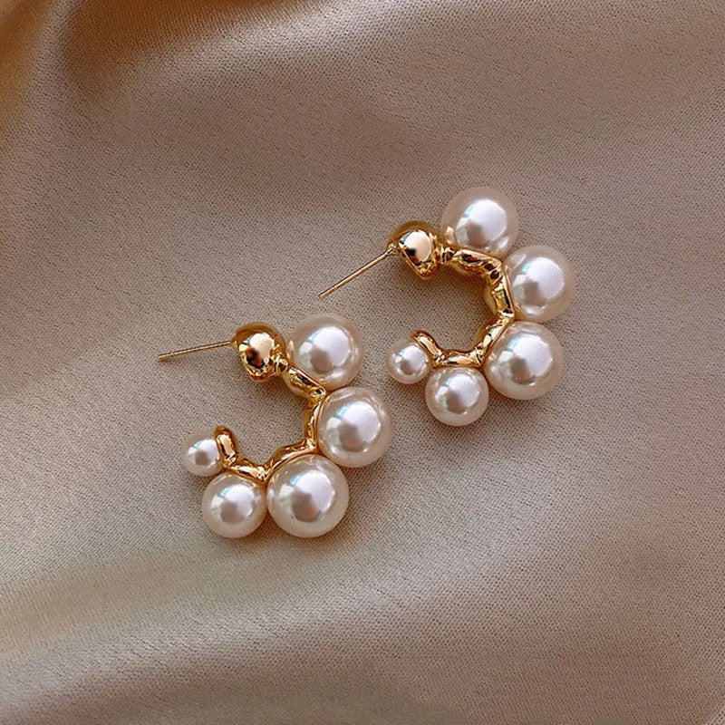 Women's red and white bell-shaped alloy earrings with pendant design