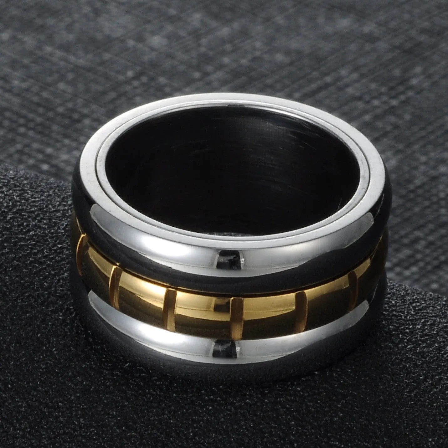 Gold titanium steel ultra-wide knuckle ring with rotatable band on finger