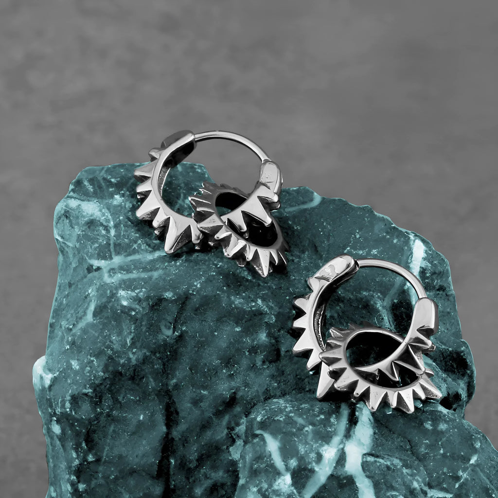 Polished stainless steel round ring earrings with retro circular design in steel colour