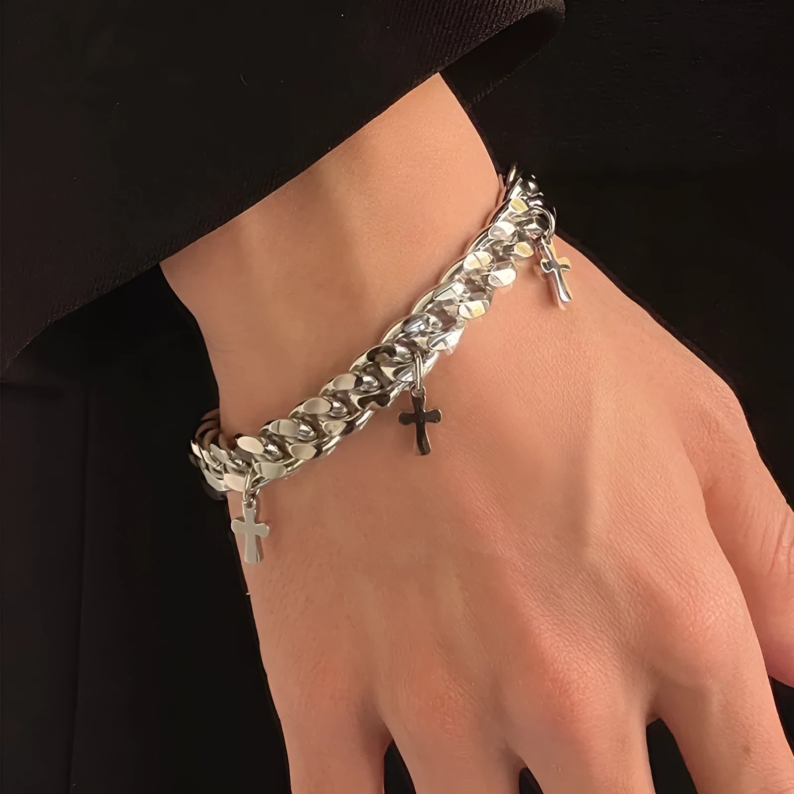 Men's titanium steel bracelet with a geometric cross charm on an adjustable strap.