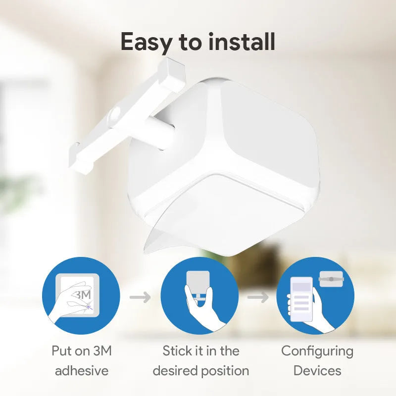 Small white Bluetooth rocker arm finger robot remote control on a surface.