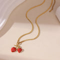Stainless steel necklace with a strawberry fruit pendant in red or white gradient colour.