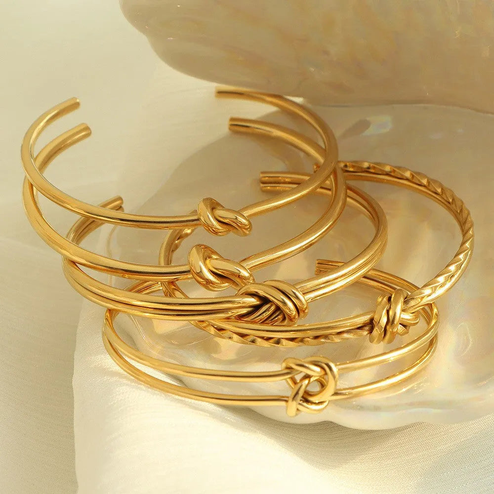 Adjustable C-shaped double-layer bracelet with knotted detail and 18K gold plating