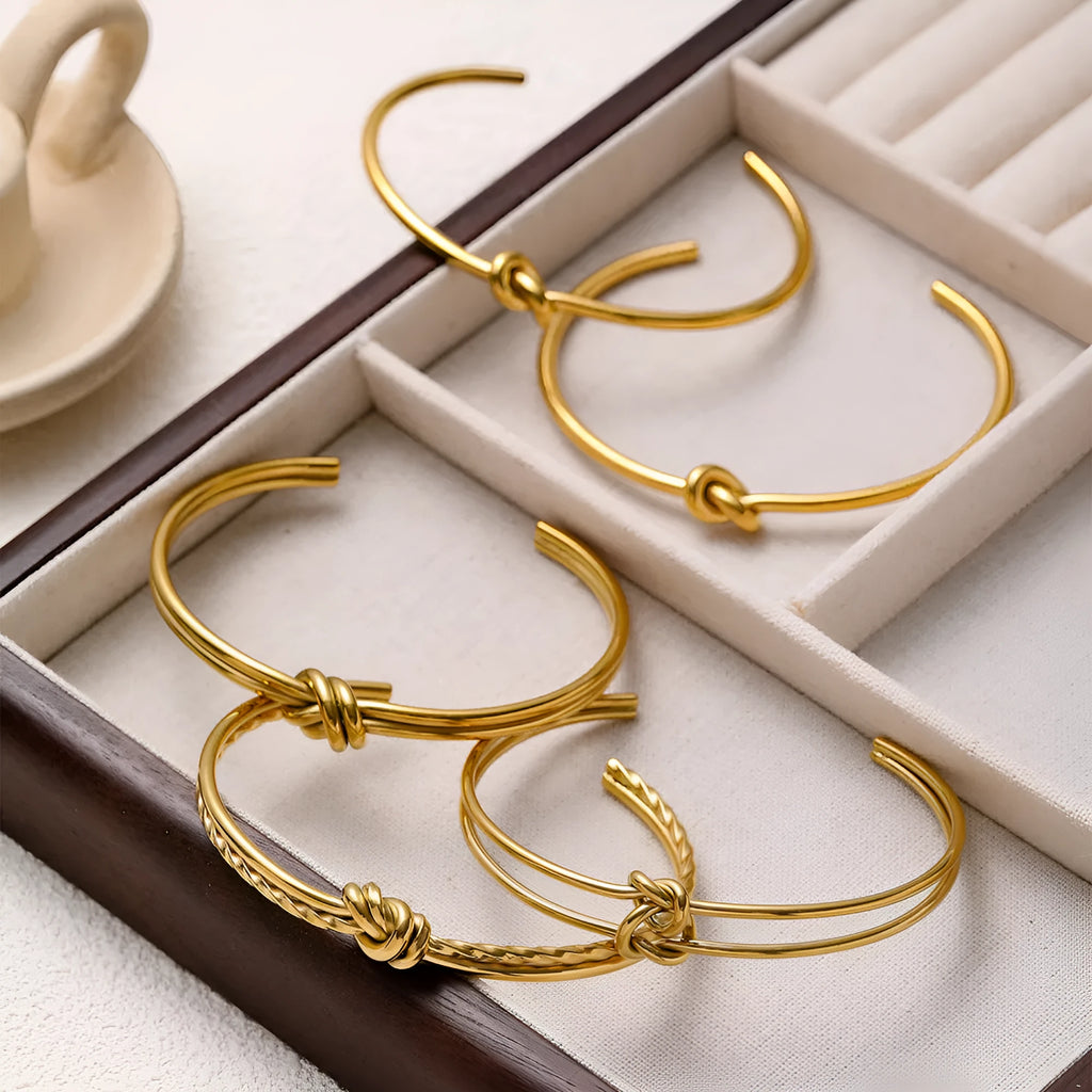 Adjustable C-shaped double-layer bracelet with knotted detail and 18K gold plating