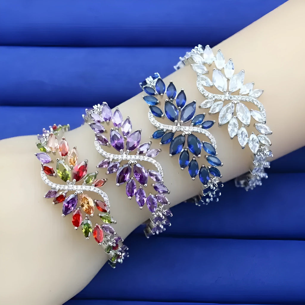 Copper bracelet with gold electroplating and coloured zircon stones in ice flower pattern design