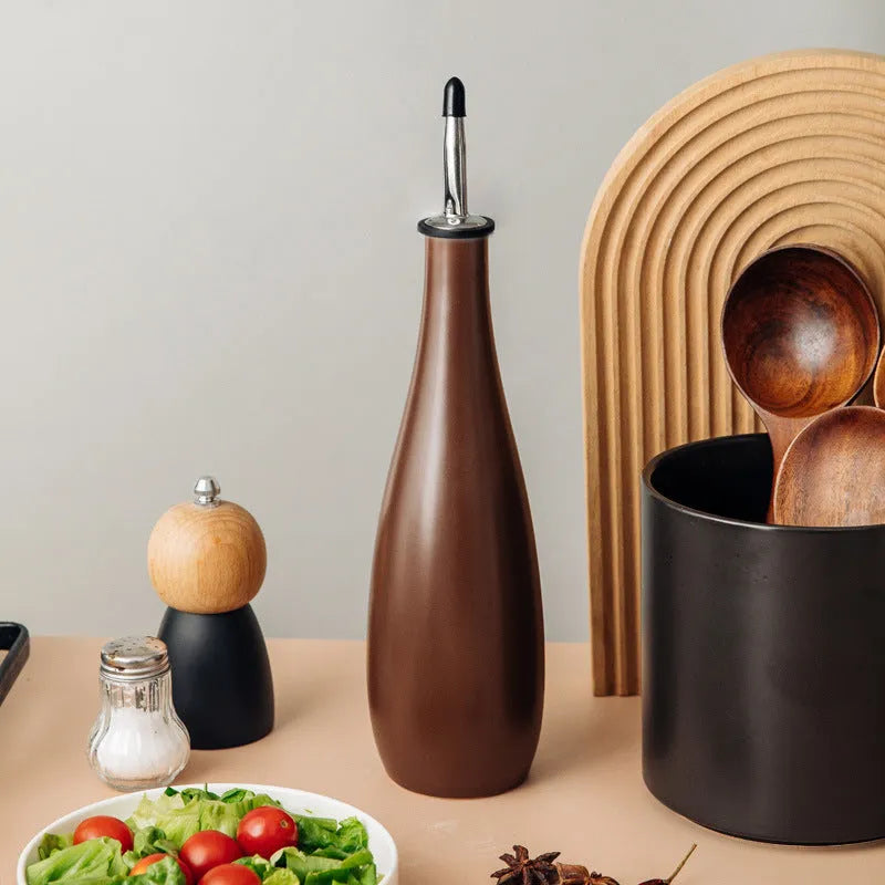 Ceramic oil pot with attached brush in black, coffee or white colours for kitchen oil storage