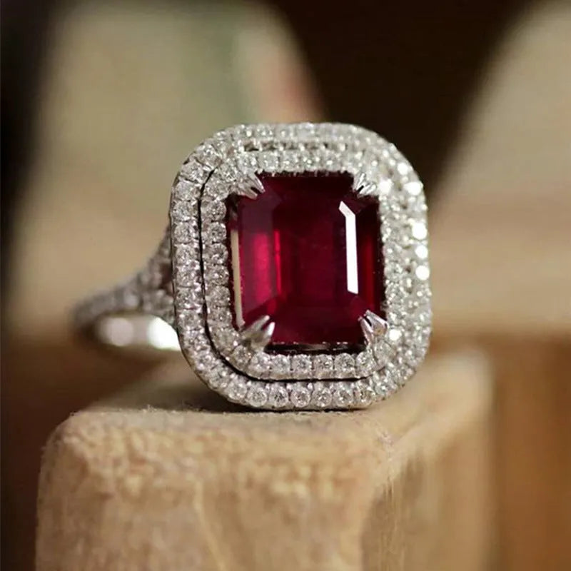 Red copper square ring with rhinestones for women, shown in size 8.
