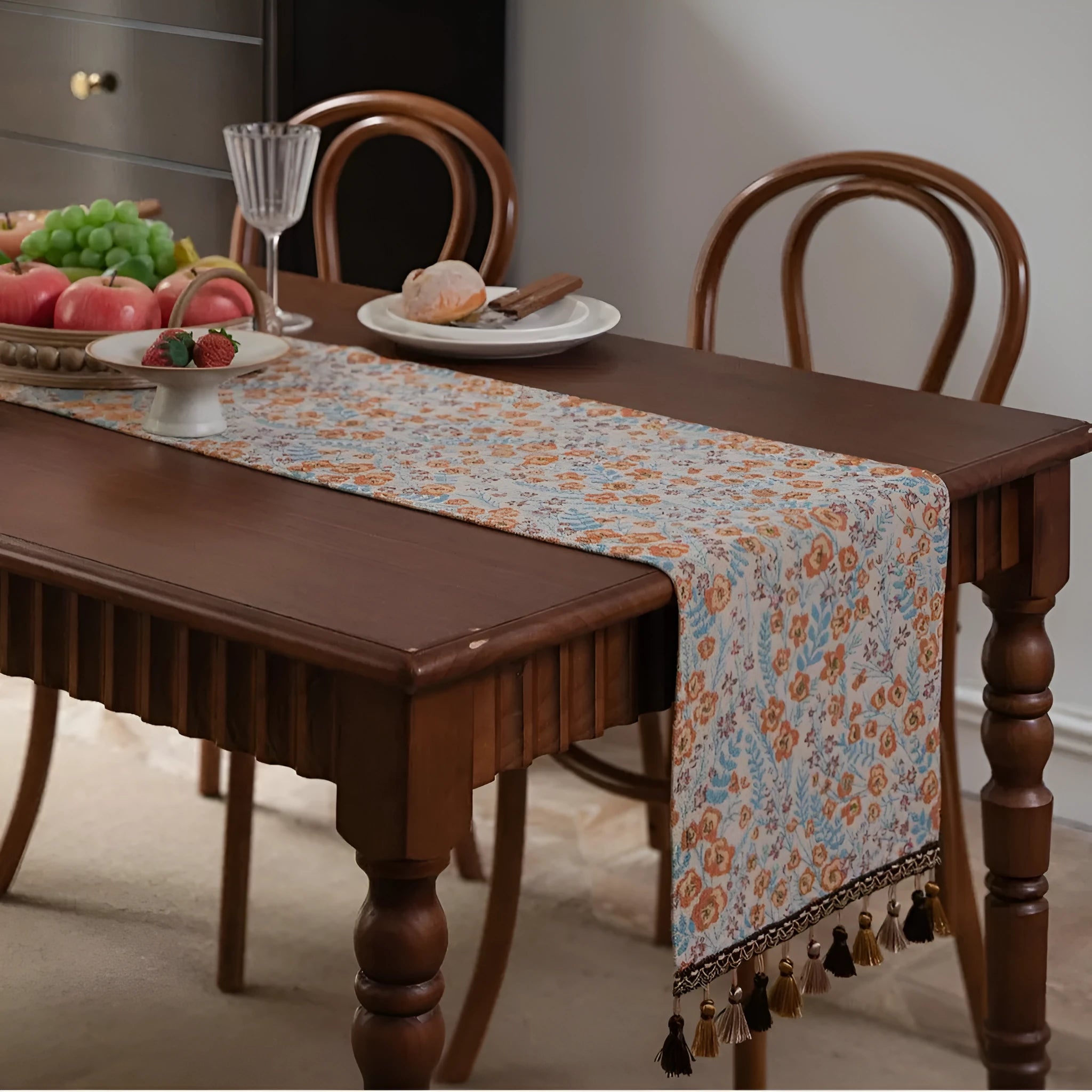 American-style long tassel table runner with Jacquard floral pattern on a table