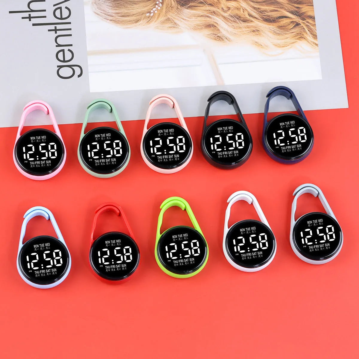 LED digital watch with luminous display showing time and weekday, available in multiple colours