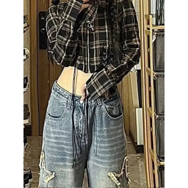 Blue high-waist straight-leg women's jeans on a neutral background.
