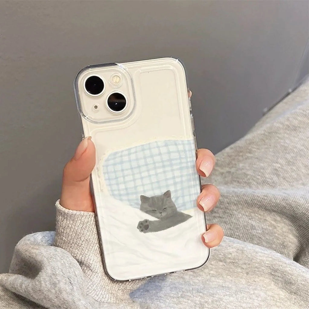 Transparent iPhone case showing sleeping cat pattern on clear TPU material for shockproof protection