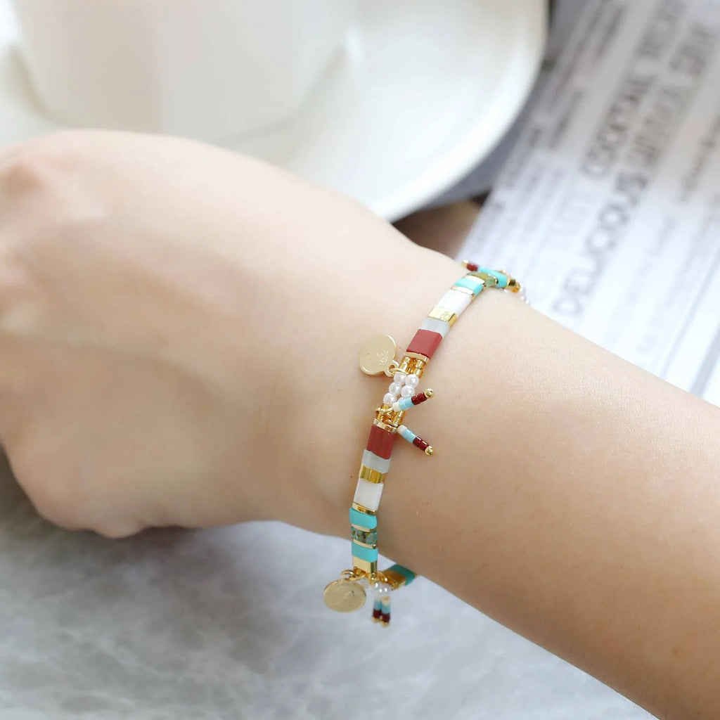 Women's handcrafted beaded bracelet with imitation pearls in original design