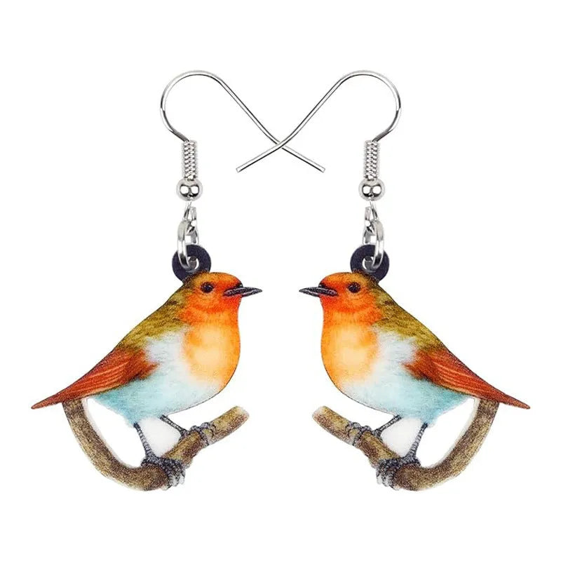 Acrylic geometric pendant earrings with a printed blue titmouse and snake chain design.