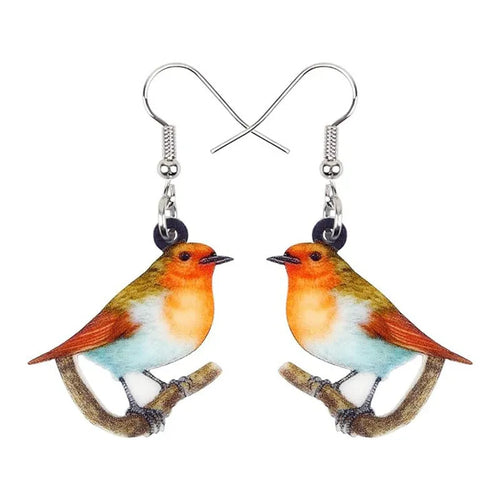Acrylic geometric pendant earrings with a printed blue titmouse and snake chain design.