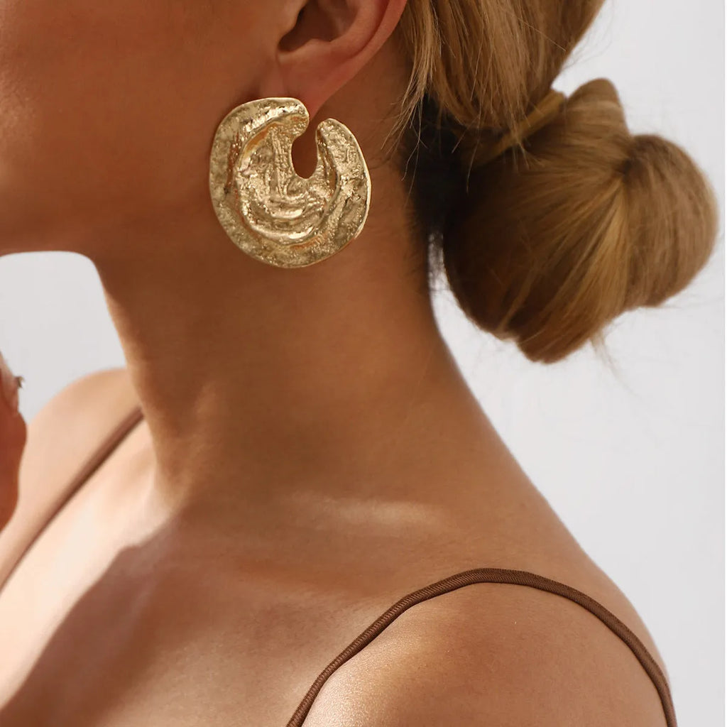 Geometric women's earrings with exaggerated irregular pleated design and concave-convex texture in gold finish