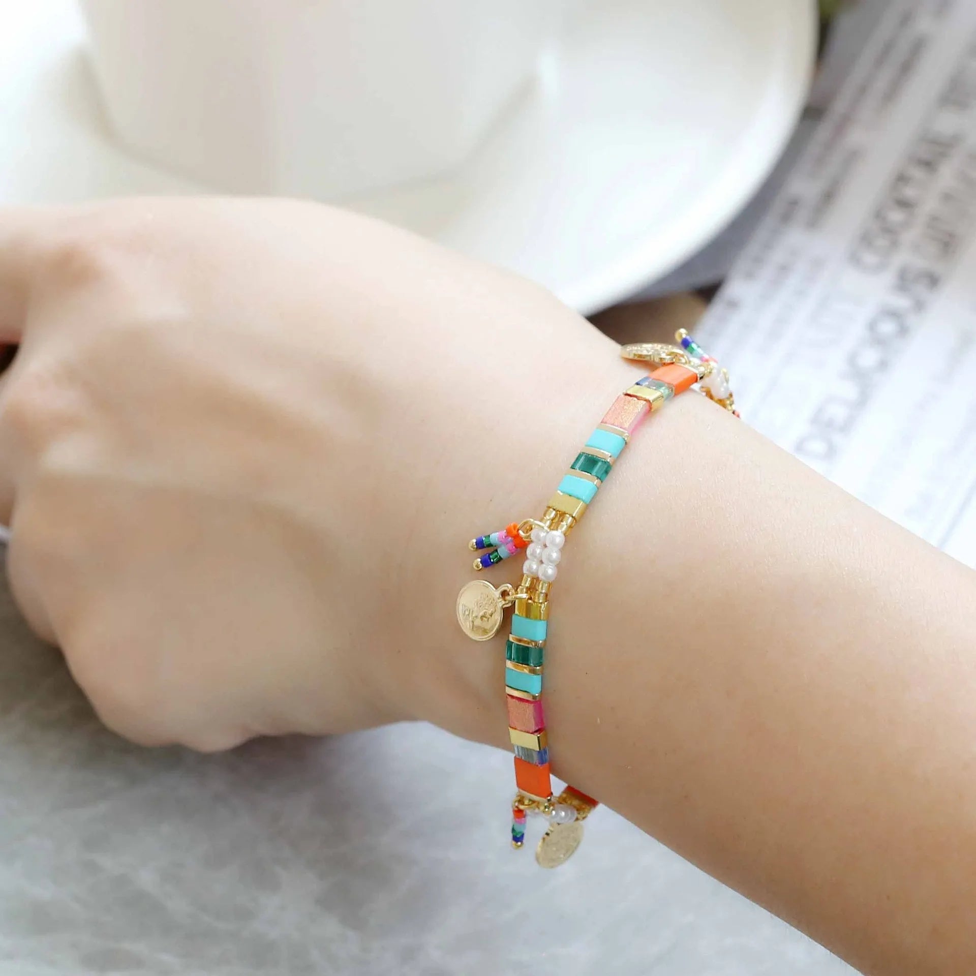 Women's handcrafted beaded bracelet with imitation pearls in original design