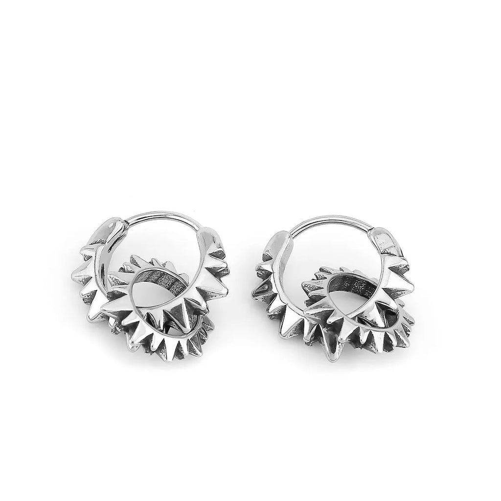 Polished stainless steel round ring earrings with retro circular design in steel colour