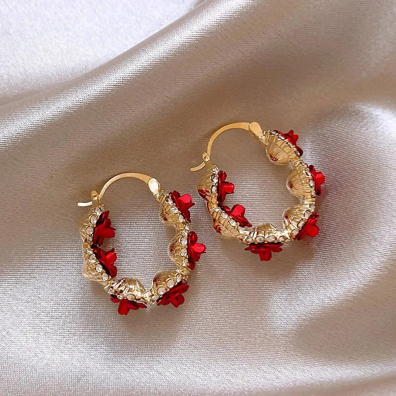 Red flower-shaped alloy clip earrings with rose motif for women