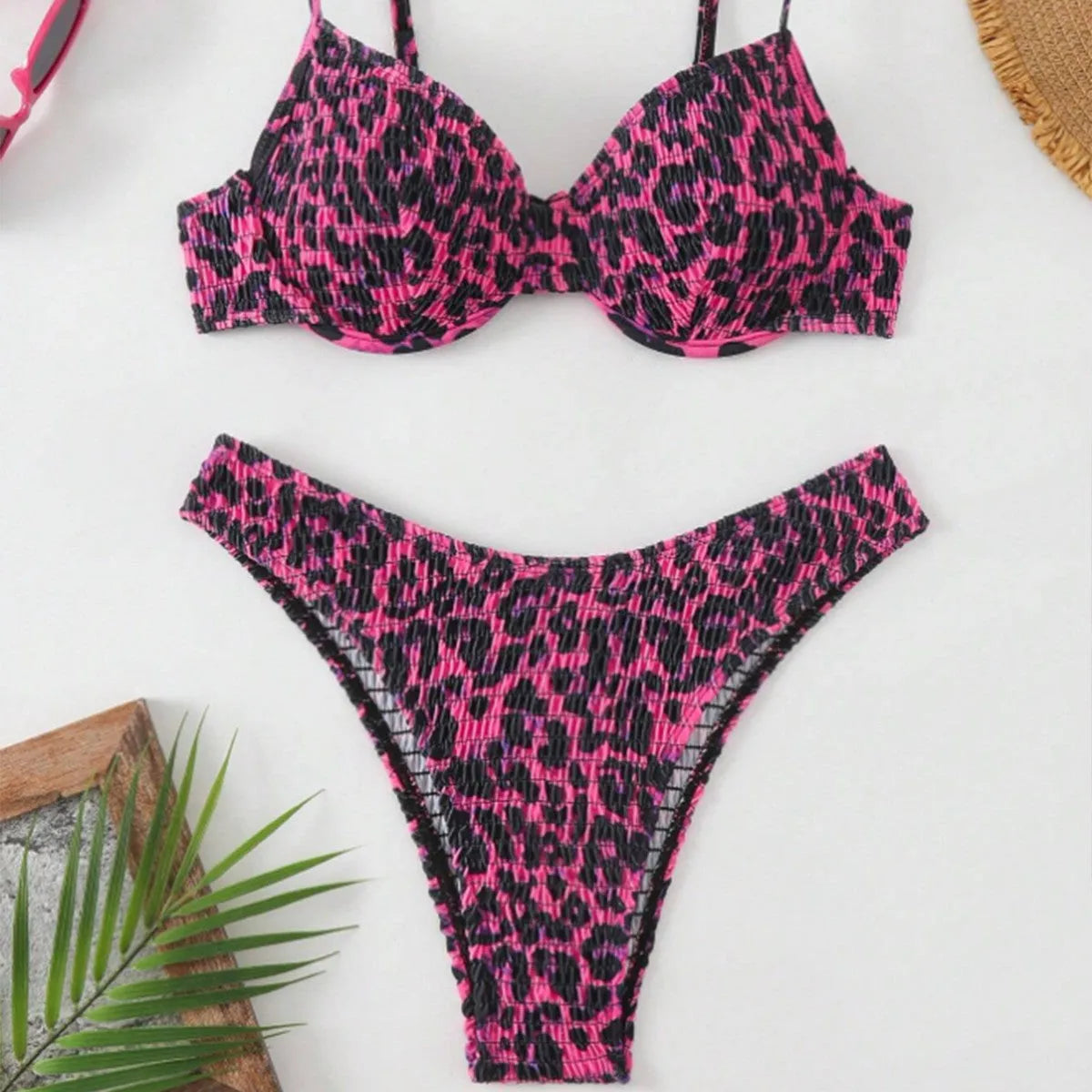 Leopard point pattern bikini swimsuit for women in a backless design.
