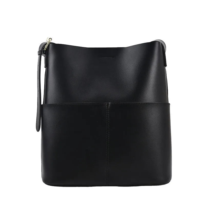Large capacity PU shoulder bag in black with decorative seaming and sandwich pocket
